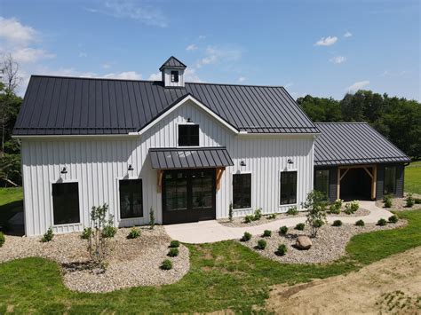 aqua board and baton house with metal roof|batten roof ideas.